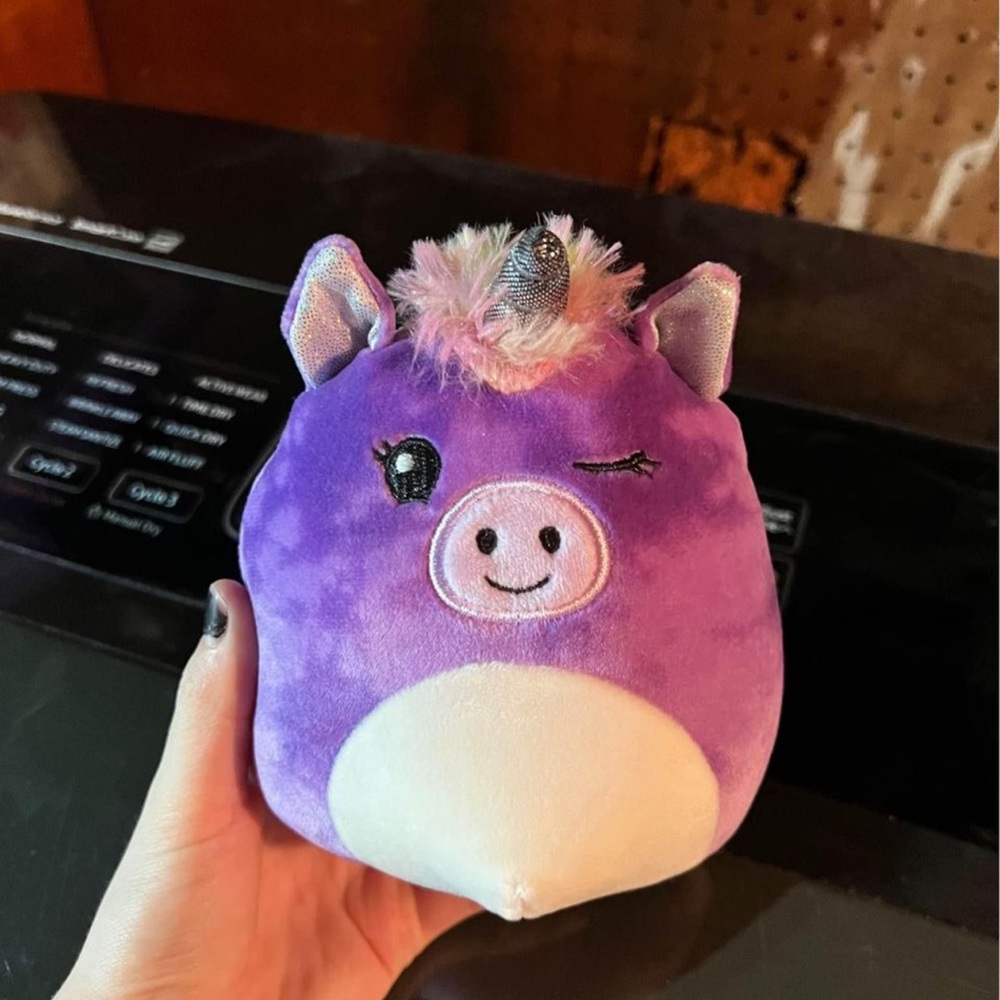 set of pink and green marble Dino squishmallows